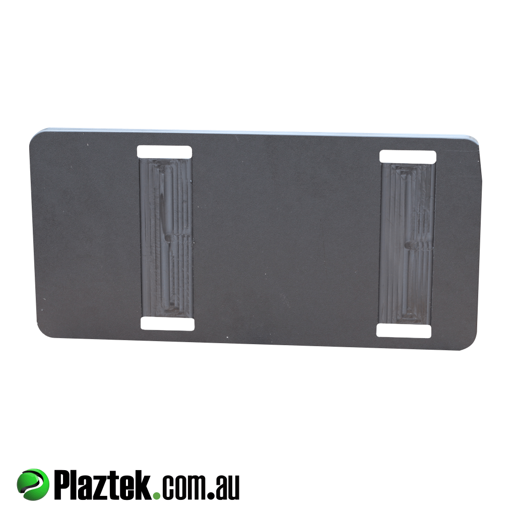 Battery tray tie down holder. Back view showing the reverse side machining to allow the tie down strap to run under the tray. This will not pinch the strap. Made in Australia.